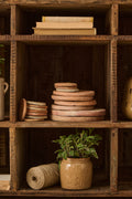 Terracotta-brik ass mønstre mellem